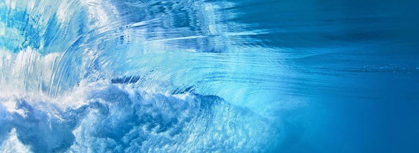 Underwater photo of ocean extreme wave breaking